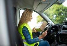 delivery driver woman box in car